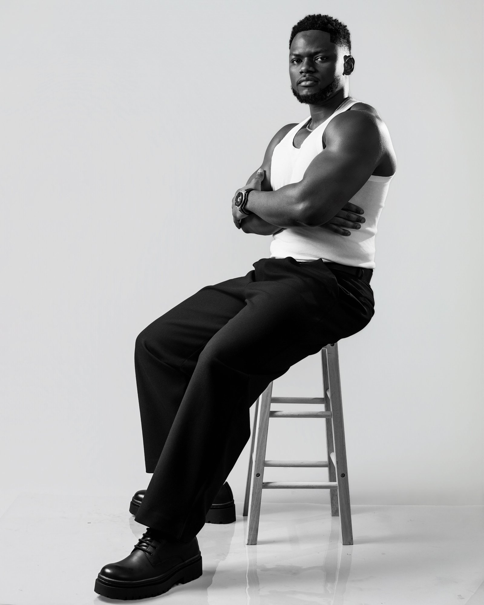Cinematic graduation portrait with glasses and kente stole, LP Studios Edmonton